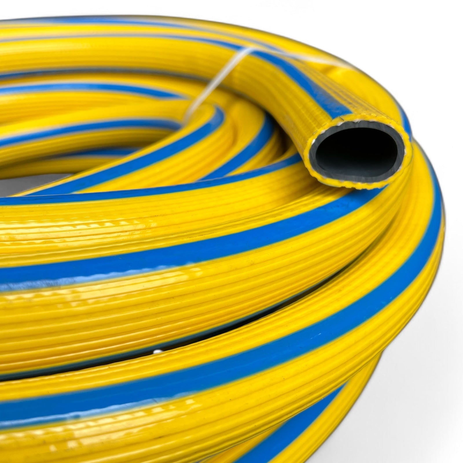 Extraflex Air Water Hose 25mm x 20m Clearance showing the yellow and blue coiled design.
