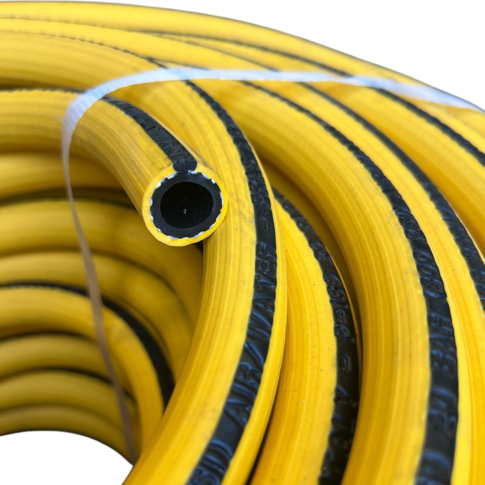 ALFAGOMMA P-189 FRAS Hose showing yellow and black striped SBR/NR material, ideal for various applications.