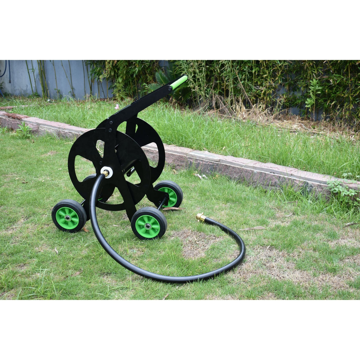 ZORRO Pro Industrial Hose Trolley and Proline Hose bundle displayed on grass with a visible garden hose.