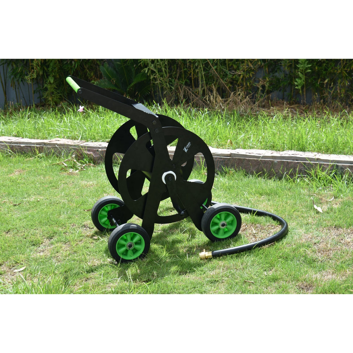 ZORRO Pro Industrial Hose Trolley and Proline Hose Bundle displayed in garden setting, showcasing durable design and functionality.
