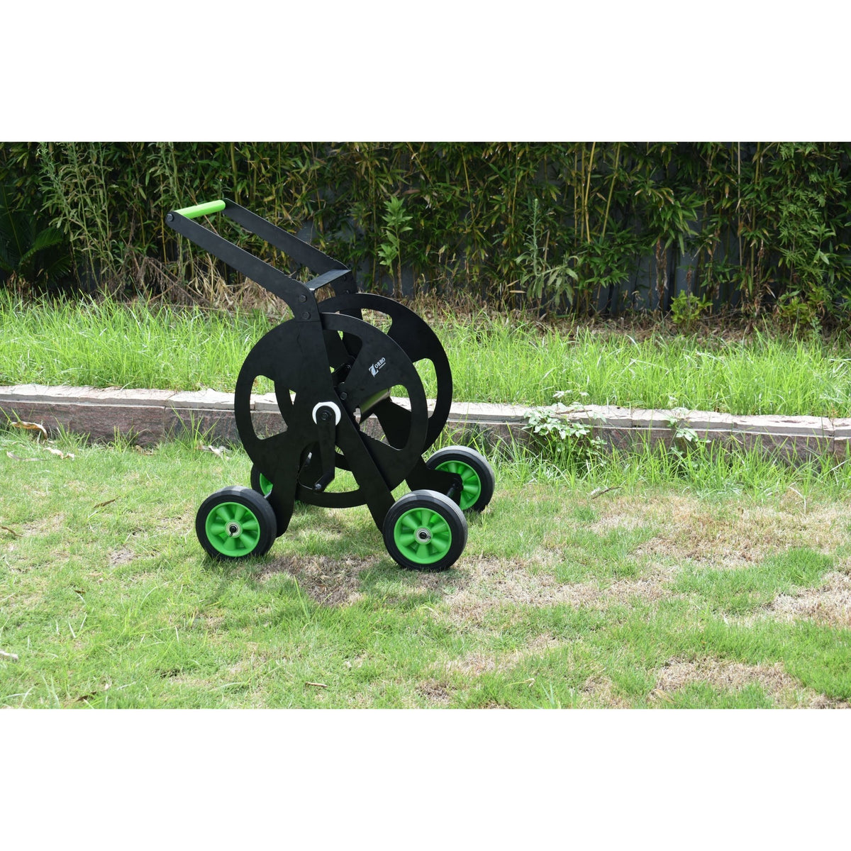 ZORRO Pro Industrial Hose Trolley and Proline Hose Bundle on green grass, showcasing durable design and mobility.