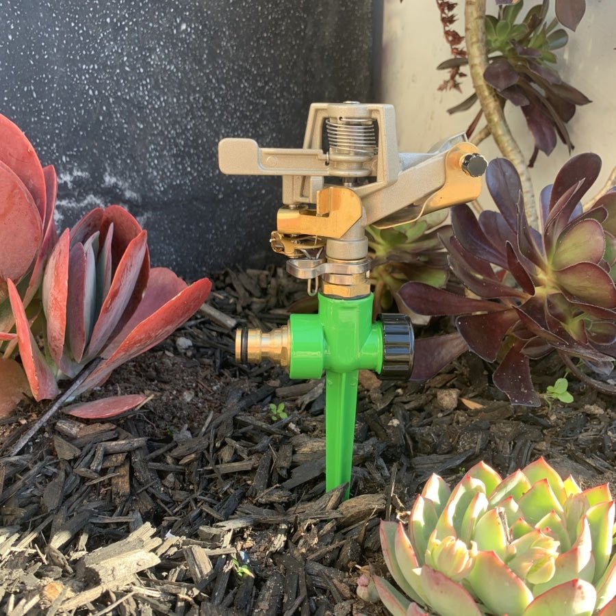 Zorro Zinc Impulse Adjustable Sprinkler on Green Spike - Hose Factory